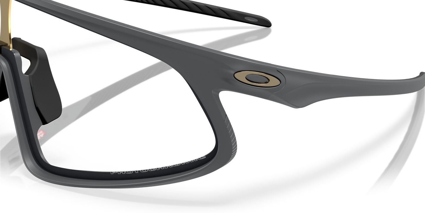 [Clear To Black Iridium Photochromic Lenses, Matte Carbon Frame]
