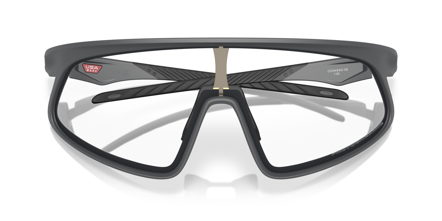 [Clear To Black Iridium Photochromic Lenses, Matte Carbon Frame]