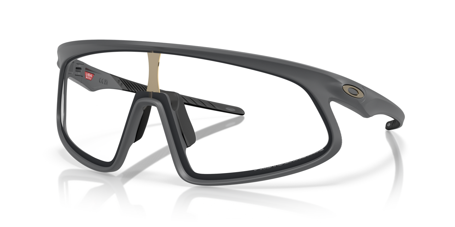 [Clear To Black Iridium Photochromic Lenses, Matte Carbon Frame]