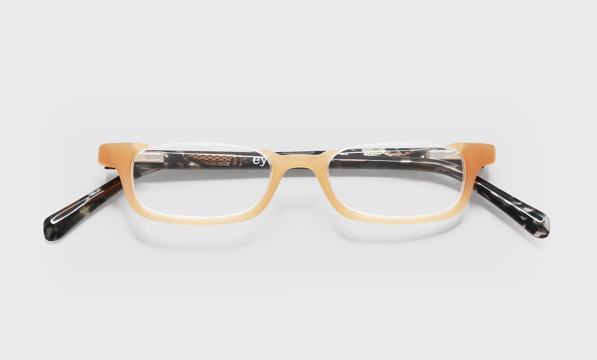 [77 - Milky Peach Front with Grey and Peach Chop Temples]