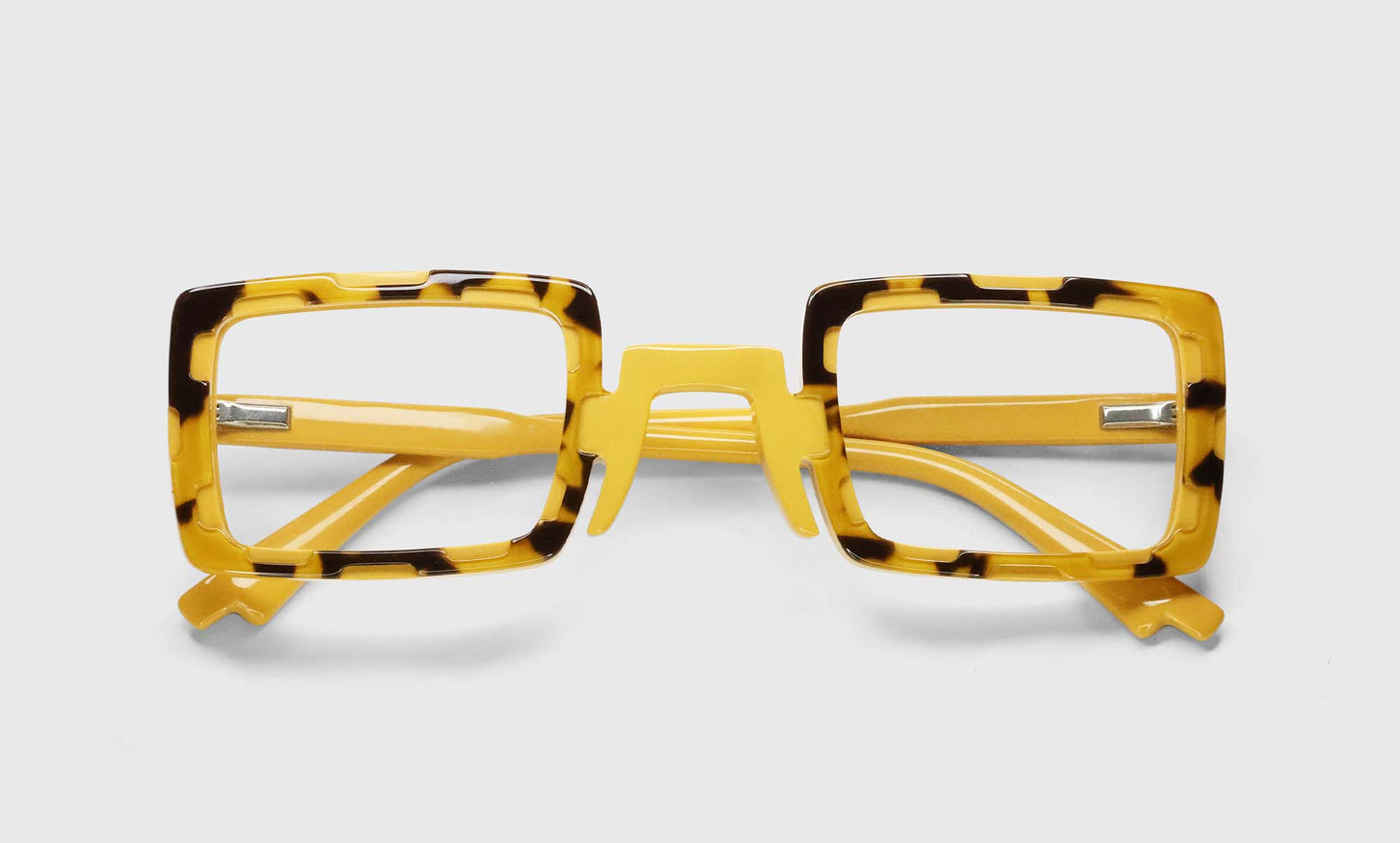 [77 - Dimensional Cut-Outs of Black and Crystal Tortoise on Top of Marigold]