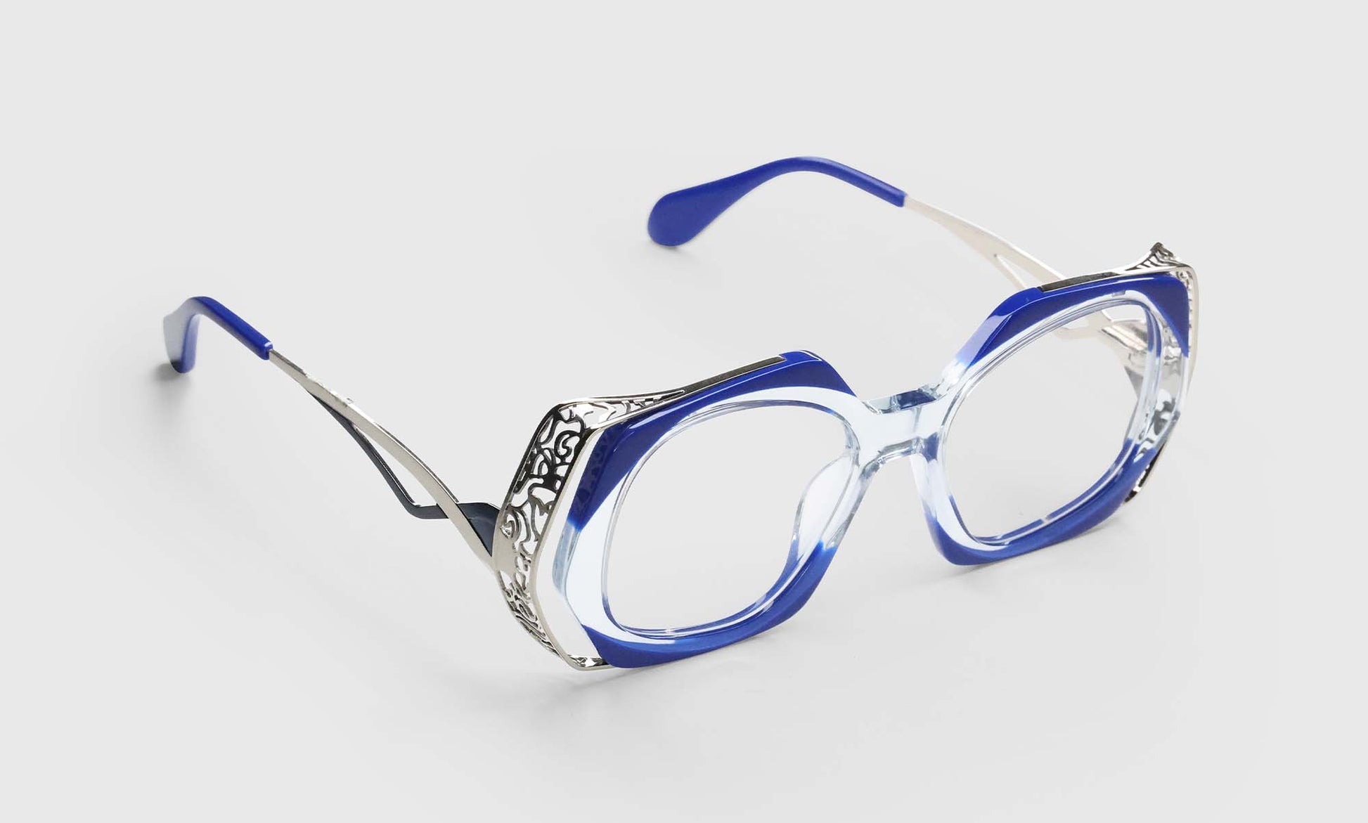 [10 - Decorative Cobalt and Clear Corners Matched with Intricate Stainless Steel Temples]