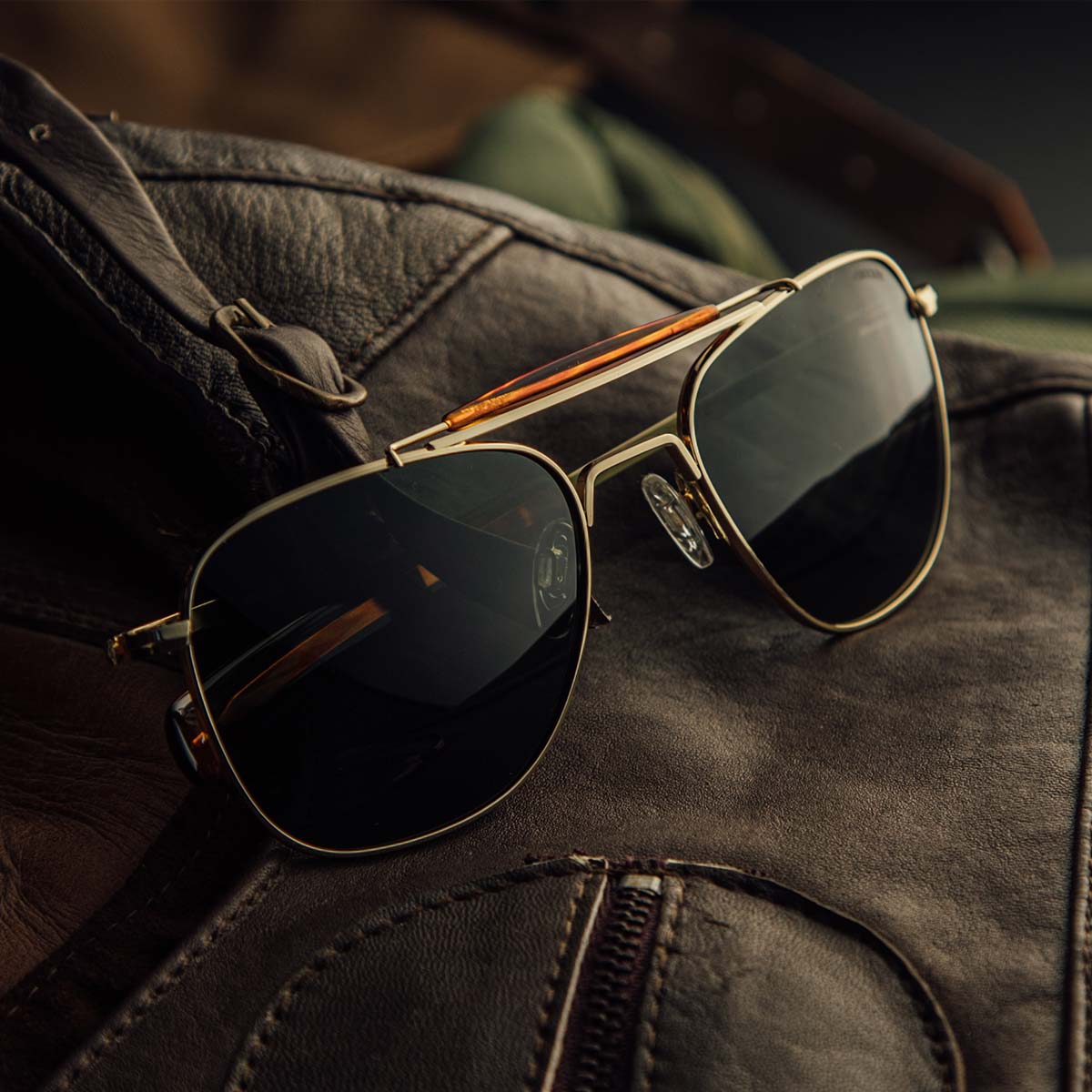 [23k Gold & AGX Non-Polarized Glass Lens]