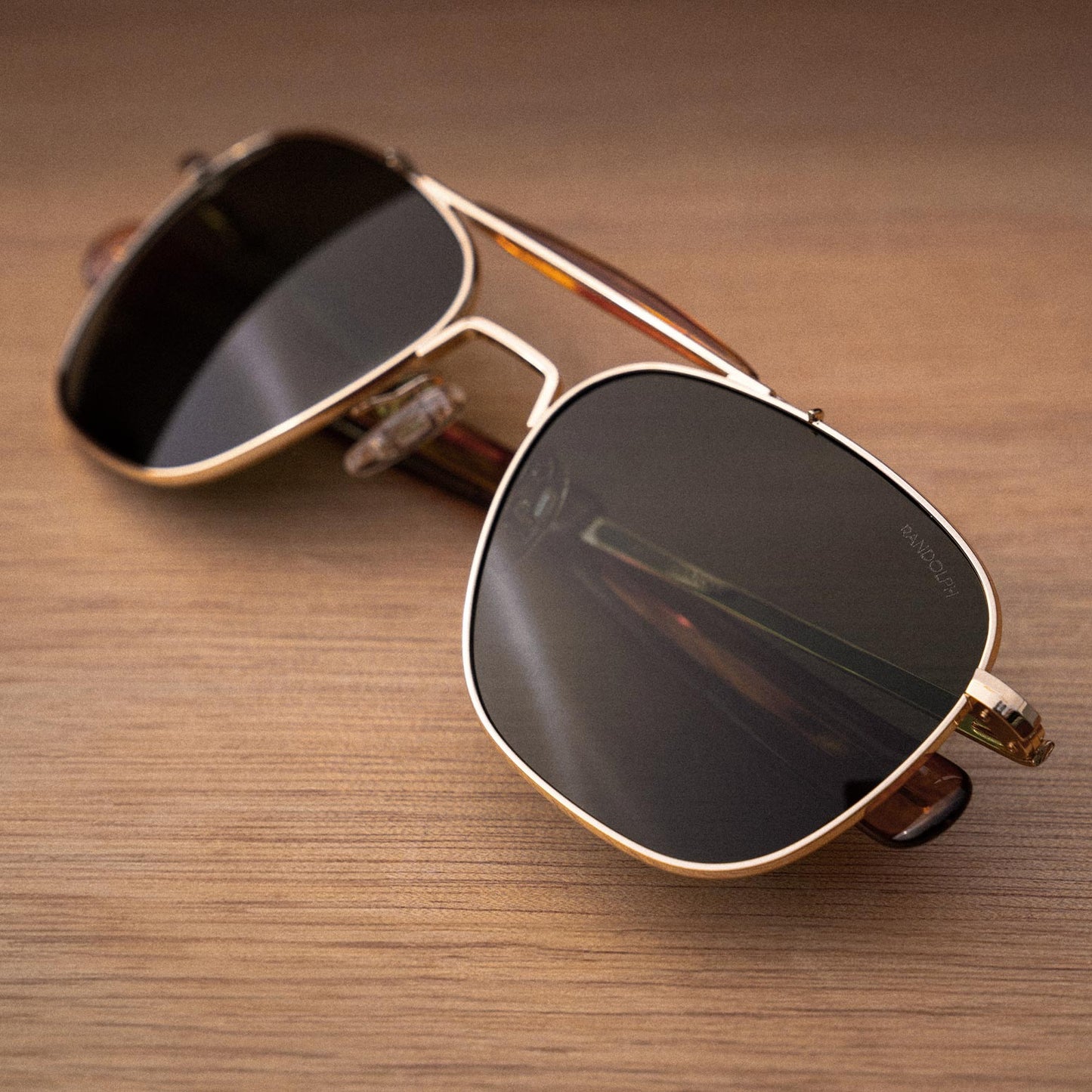 [23k Gold & AGX Non-Polarized Glass Lens]